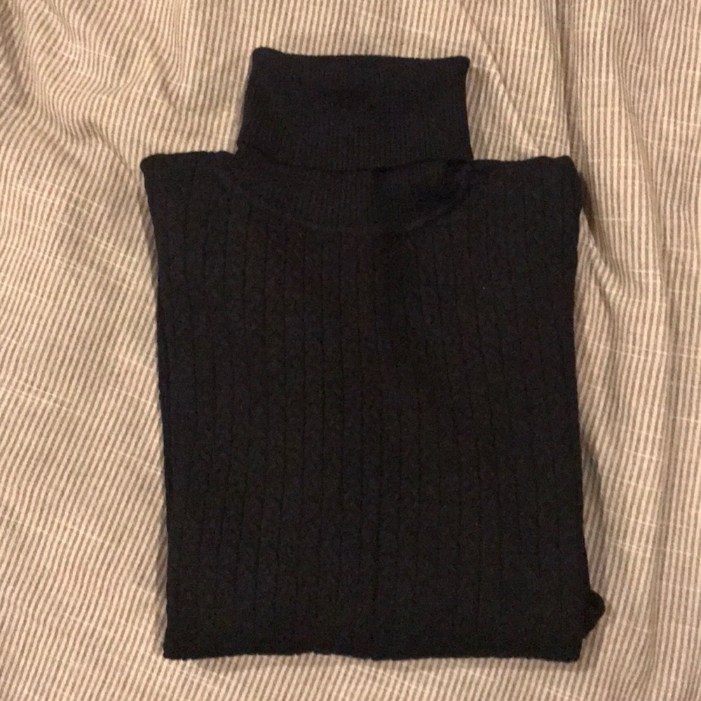 Black Turtleneck by French Designer